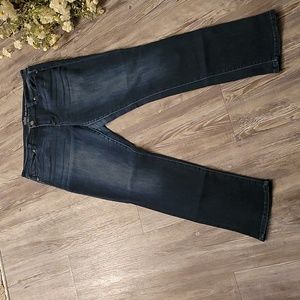 Dark denim rinse 5 pocket high waist skinny jeans.